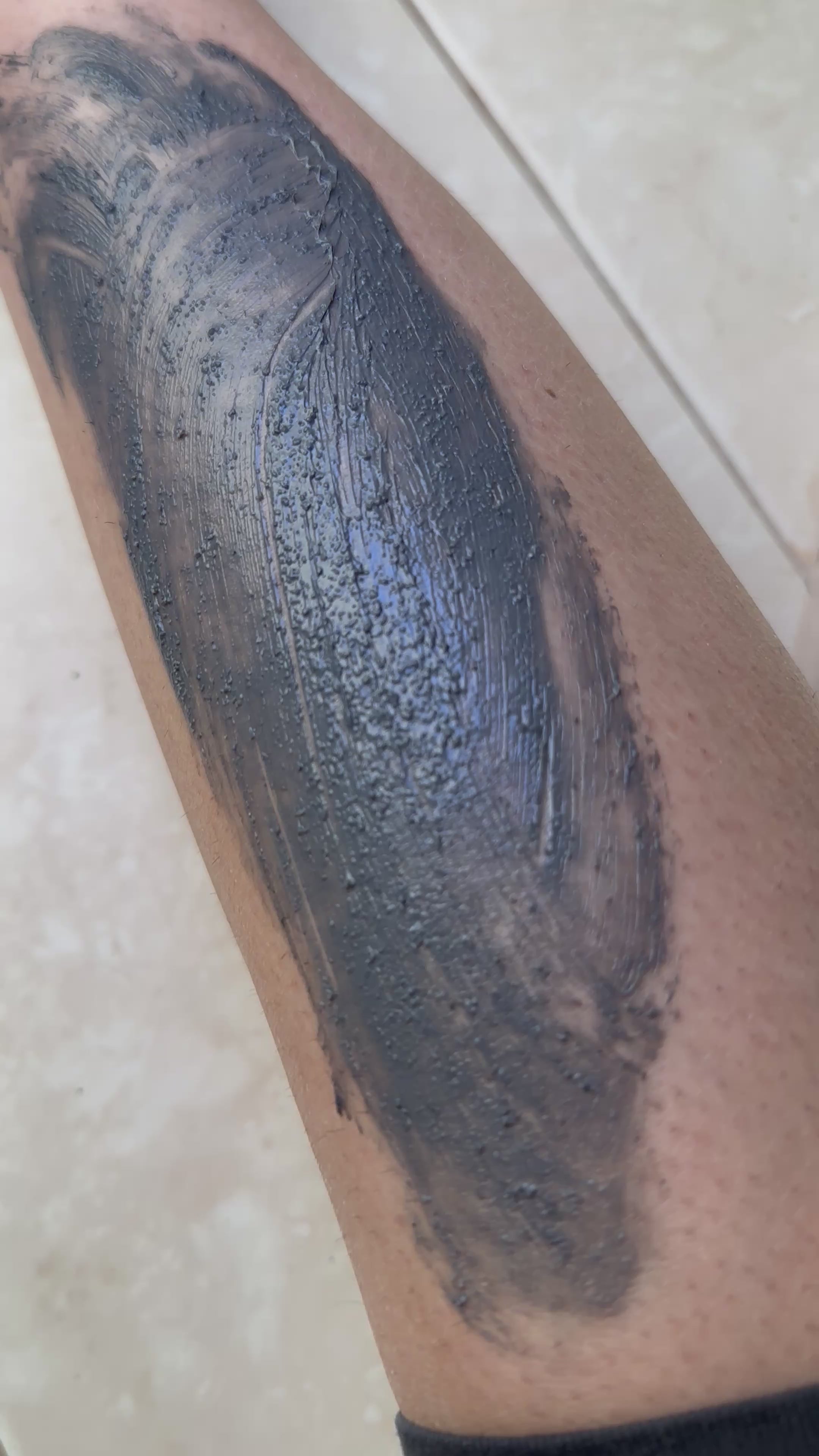 Charcoal scrub on legs